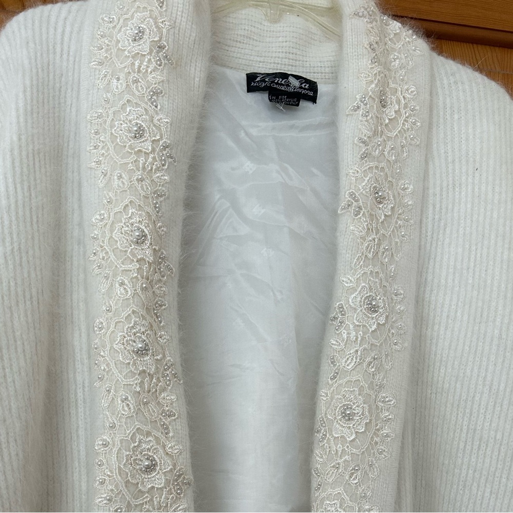 Luxury angora sweater.. fully lined, crocheted lace with beads.